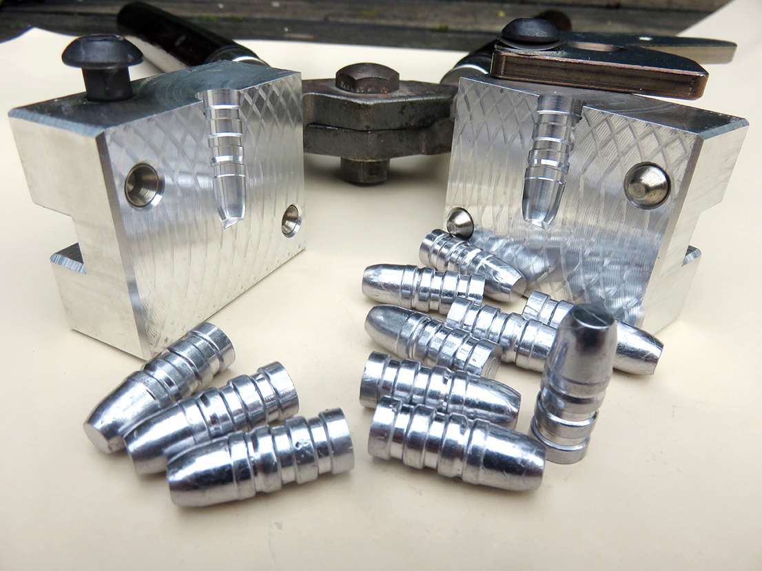 Accurate Molds’ aluminum blocks with a batch of fresh bullets for the 32.